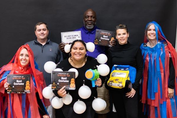 College employees dressed up as a car wash for Halloween Costume Content